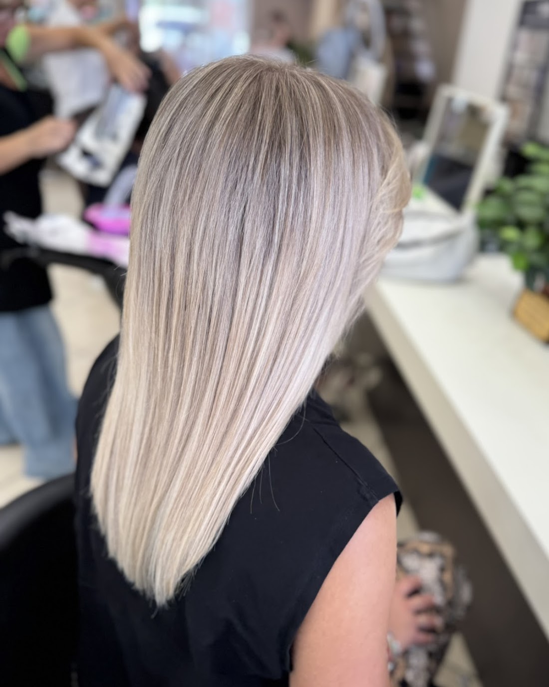 Glossy blonde balayage styled by the team at Hair Heaven salon in Athens